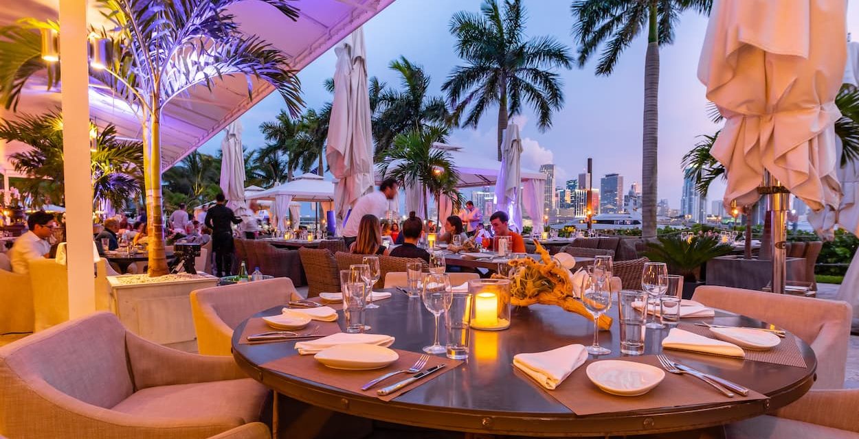Miami’s Most Luxurious Restaurant, The Deck at Island Gardens, Launches New Sunset Society Happy Hour